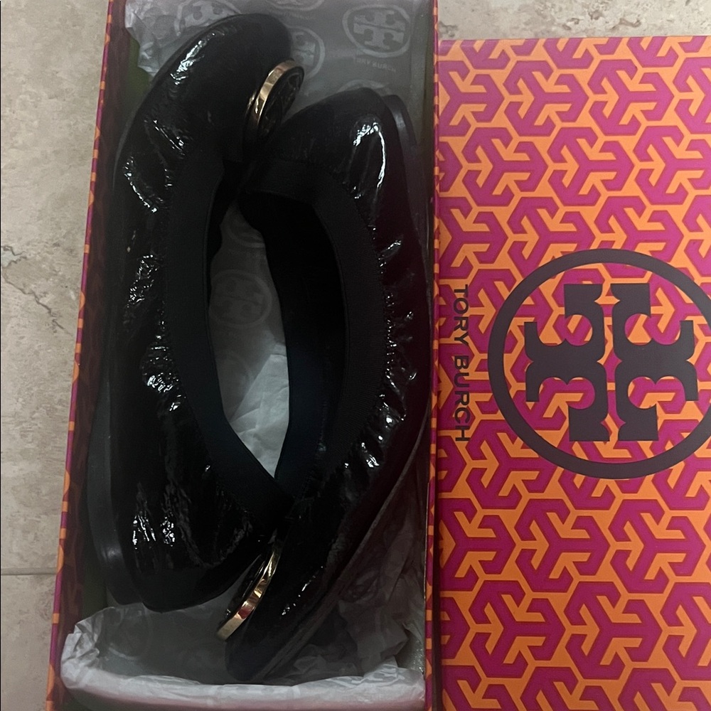 Tory Burch Glossy Black Flats with Gold Emblem